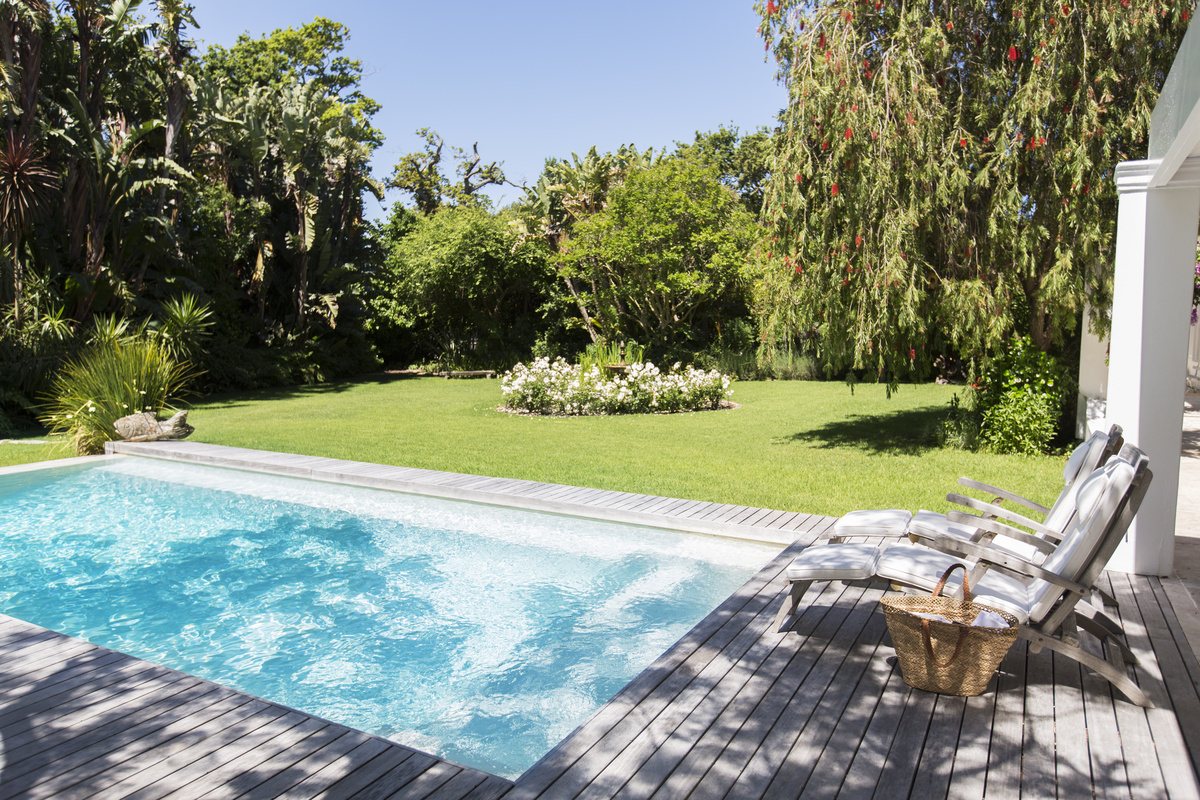 Backyard pool and lawn